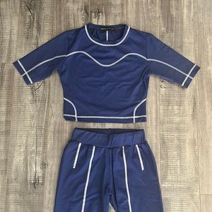 Beautiful legging and crop top outfit by Trussardi Sport.